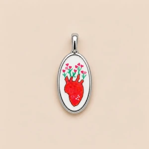 Ciondolo resina cuore anatomico rinascita argento